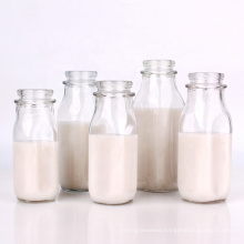 Wholesale 240ml 280ml 16oz 1000ml clear square milk glass bottle with lid